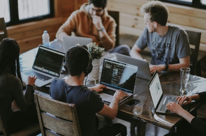 People working on a laptop