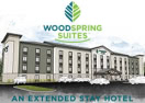 WoodSpring Hotels logo